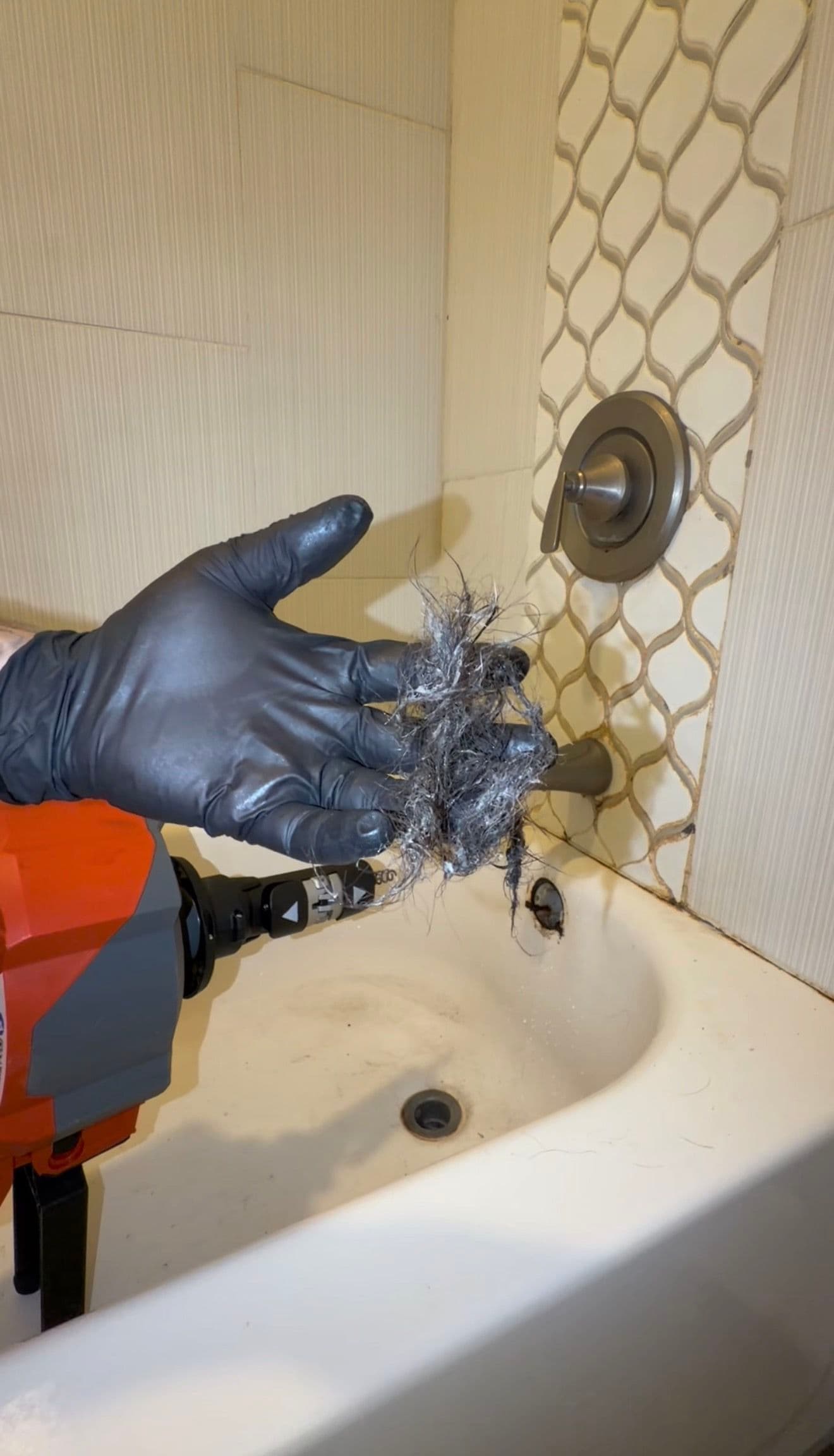 Project Stubborn Bathtub Clog Cleared with a Ridgid K-46 image